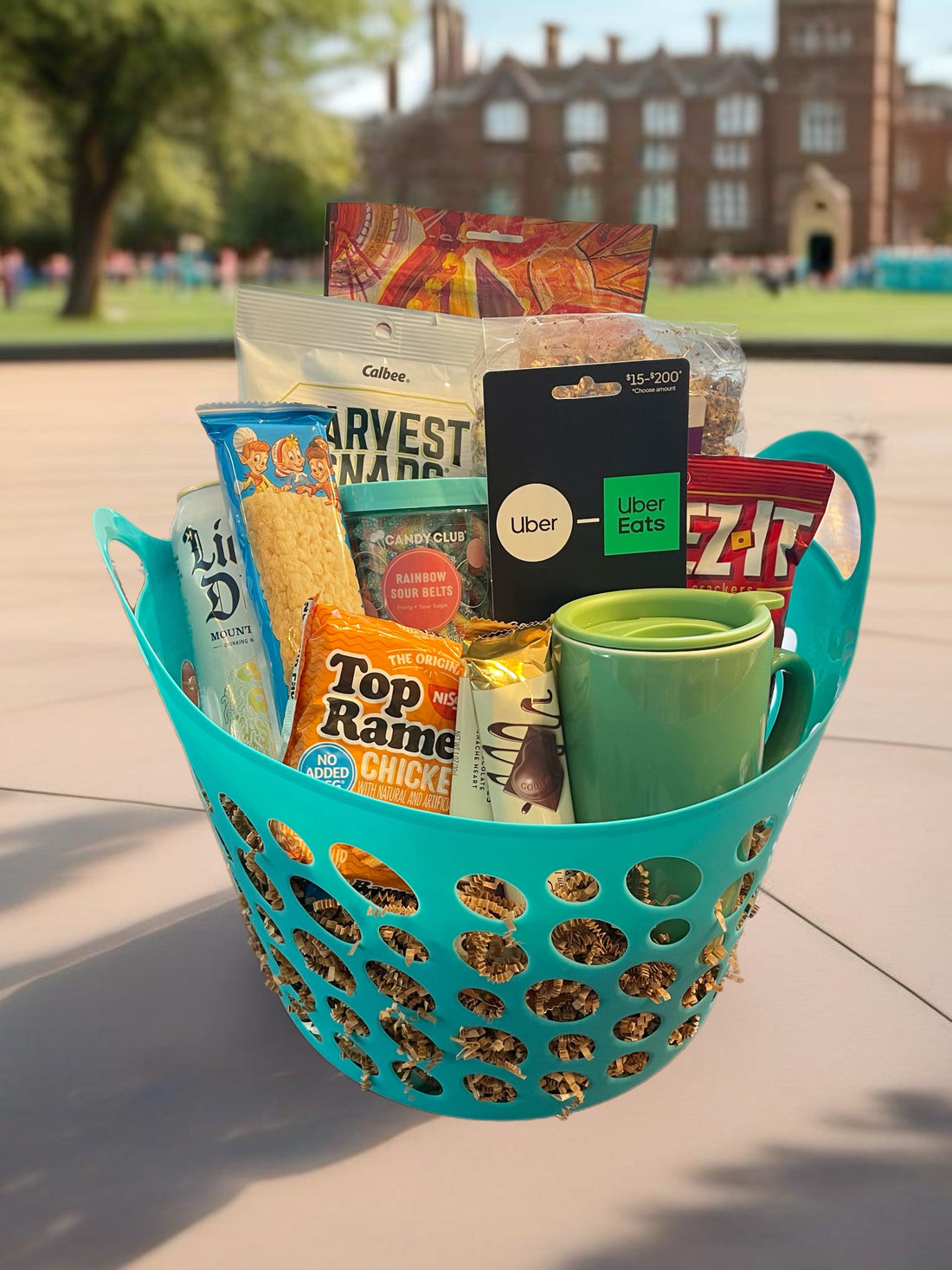 College Bound gift basket with travel mug, snacks, and dorm essentials for a freshman care package